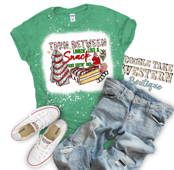 Torn Between Lookin' like a Snack Christmas Tree Christmas Bleached Graphic T-Shirt