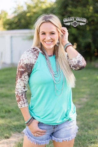 Turquoise Cowhide Twist Hem Raglan - Nico Bella Boutique 